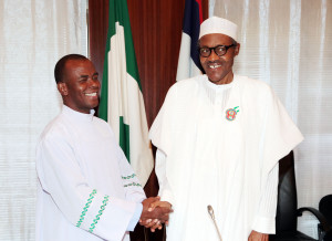 PRESIDENT BUHARI RECEIVES REV FR MBAKA. 0A. R-L; President Muhammadu Buhari and Rev Father Mbaka during an audience with President Buhari at the State House. DEC 18 2015.